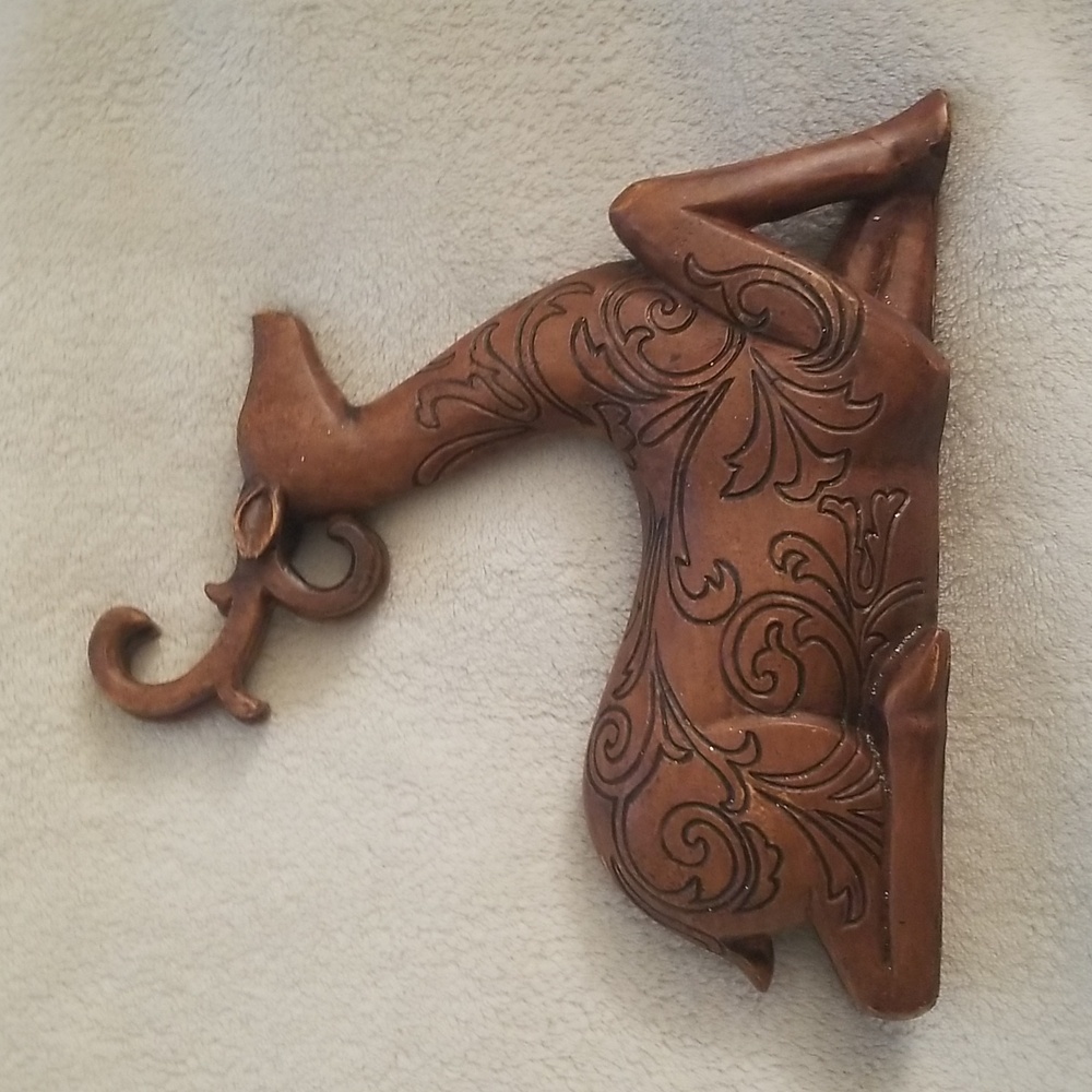 Carved look deer/reindeer wooden look,  made of resin?